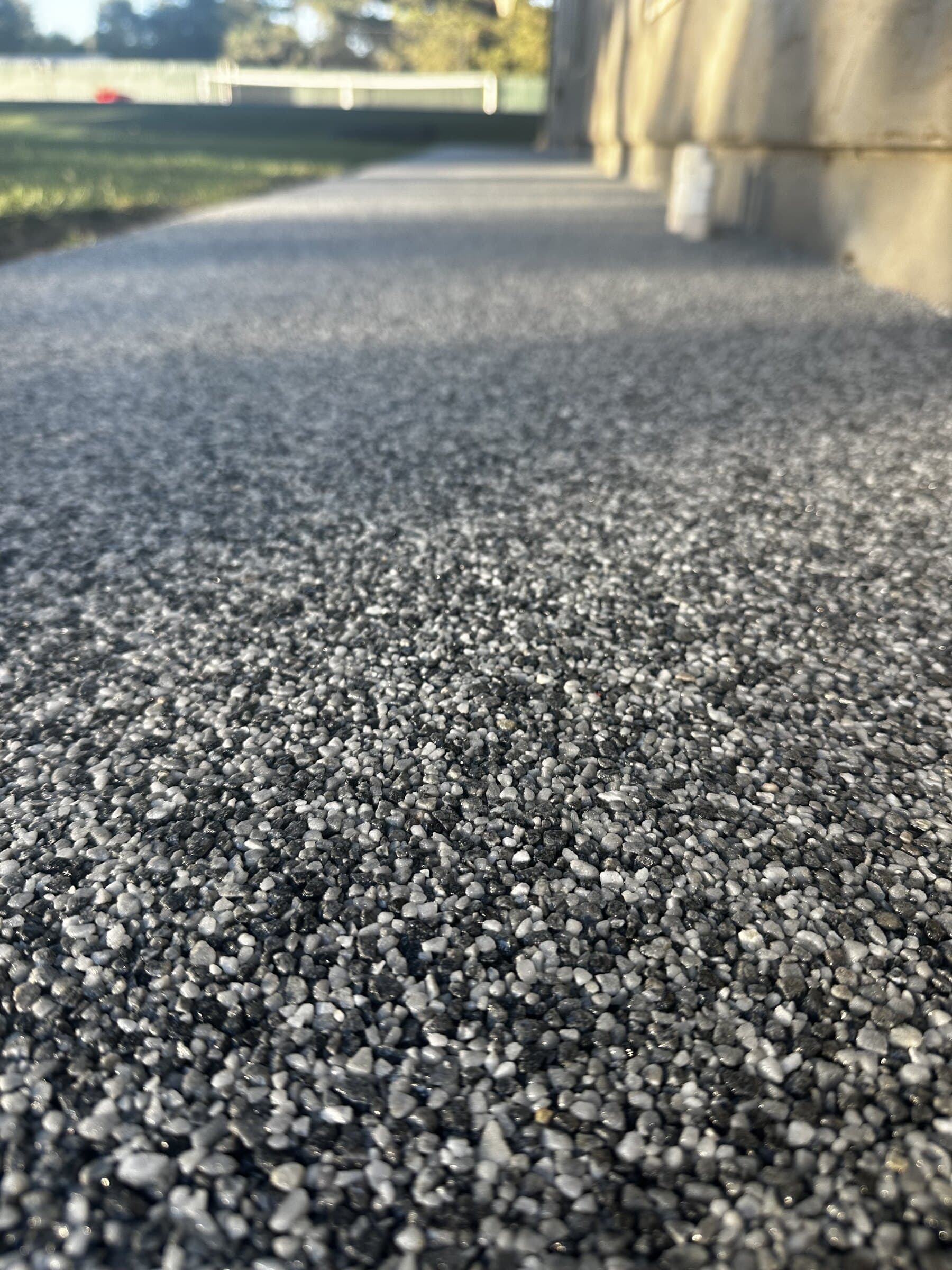 Close-up of a grey Vuba Stone resin-bound walkway
