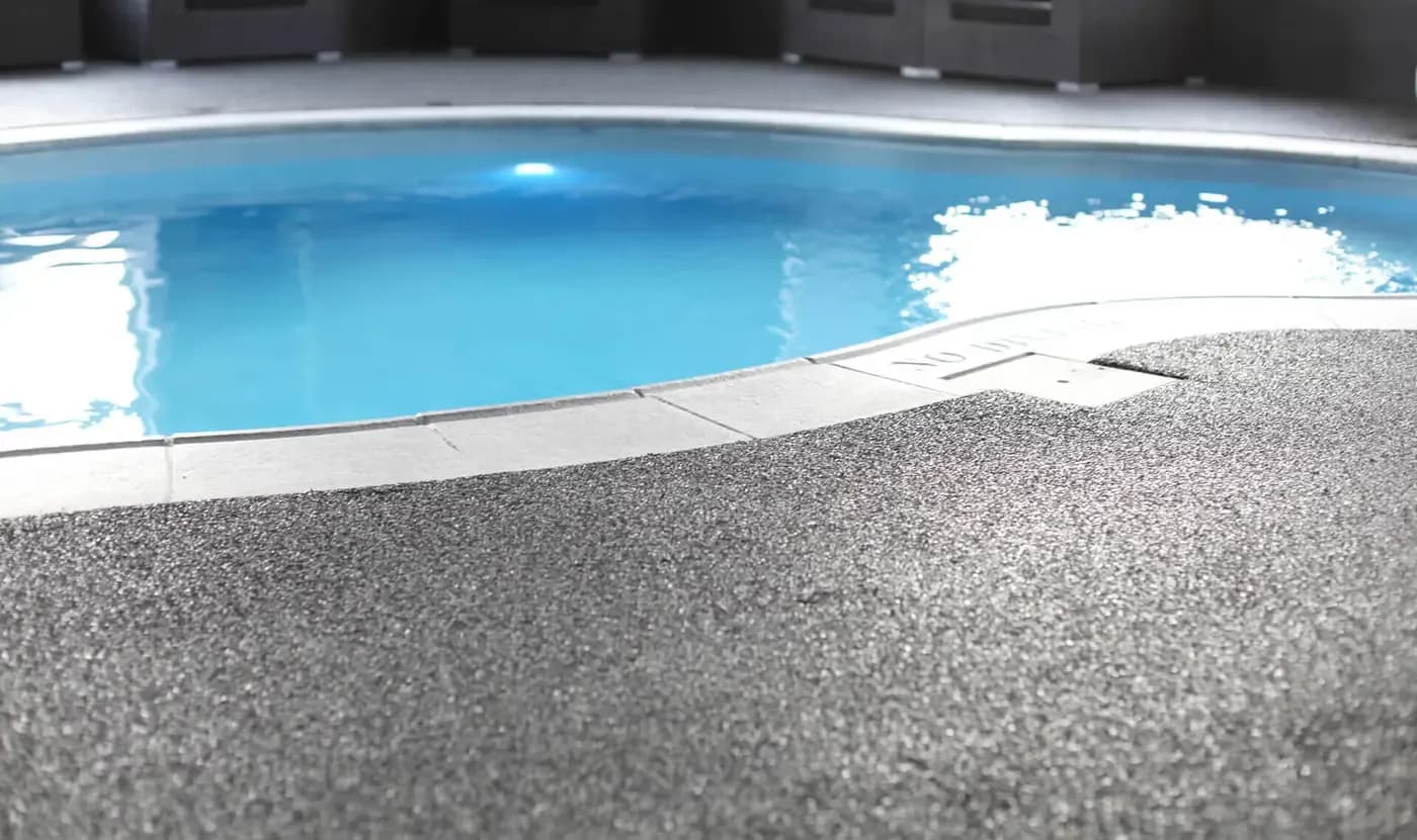 Close-up of grey Rubber Stone at a pool edge